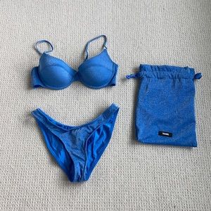 Never worn Sparkly blue trangl set with travel bag